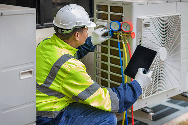 Professional Air Conditioning Repair technician working in Woonsocket, RI